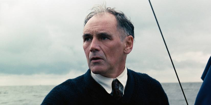 Mark Rylance on a boat looking worried in Dunkirk