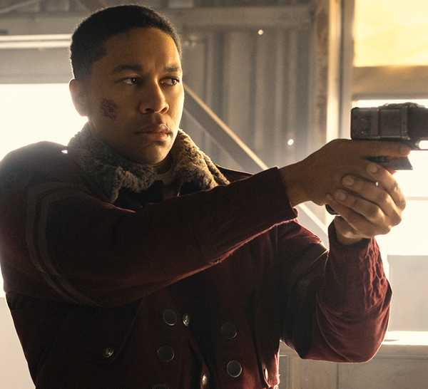 Aaron Moten as Maximus aims a weapon off camera in Fallout Season 2