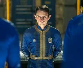 Moisés Arias as Norm faces other vault dwellers in Fallout Season 2