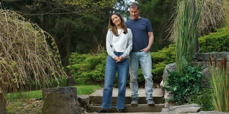 Christina Chang as Yuna and Dylan Walsh as David Hollander on 'Heated Rivalry.'