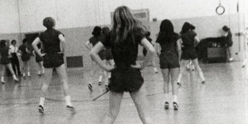 A group of girls doing a dance routine in High School