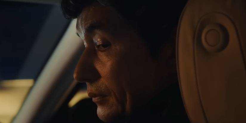 Percy (Hyun Wanner) looking back at the passenger seat in Maxton Hall.