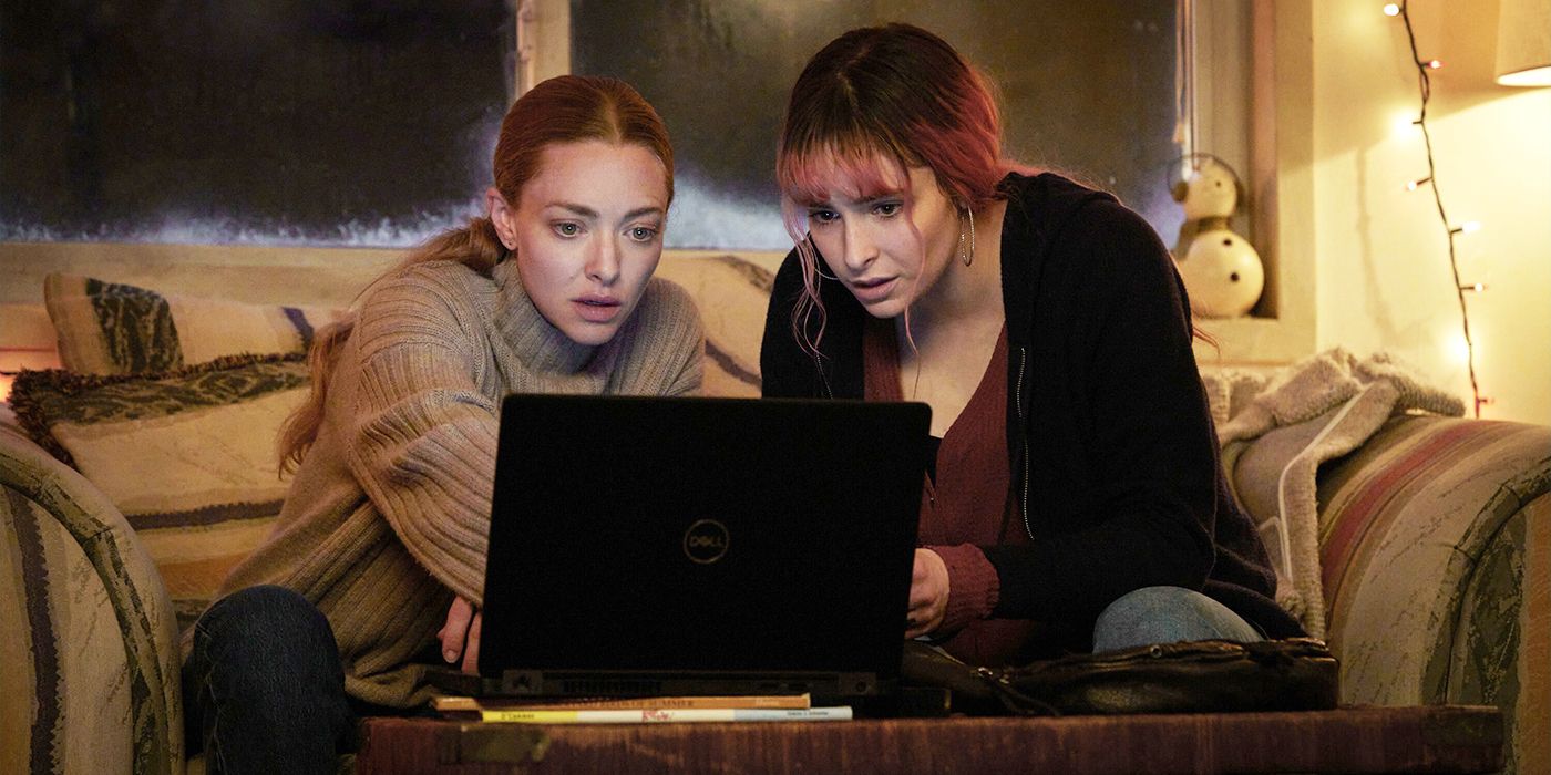 Amanda Seyfried and Ashleigh Cummings looking at a computer together in Long Bright River