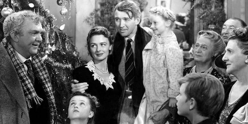 Jimmy Stewart with his friends and family in It's a Wonderful Life