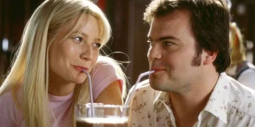 Gwyneth Paltrow and Jack Black with two straws in the same cup sharing a drink in Shallow Hal.
