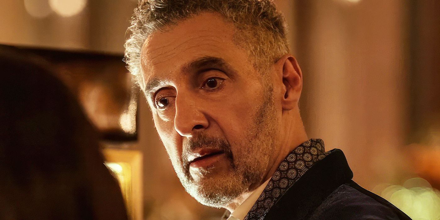 John Turturro looking skeptical in Mr. & Mrs. Smith
