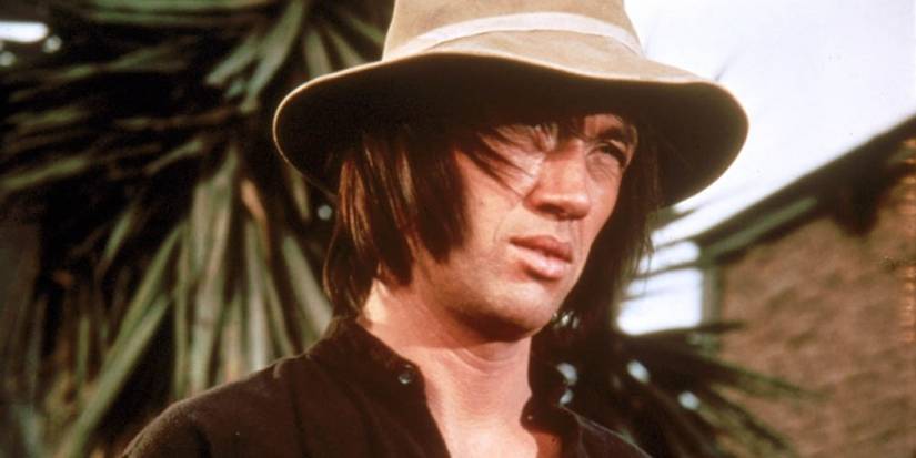 Kwai Chang Caine (David Carradine), with long hair and a hat, in Kung Fu.
