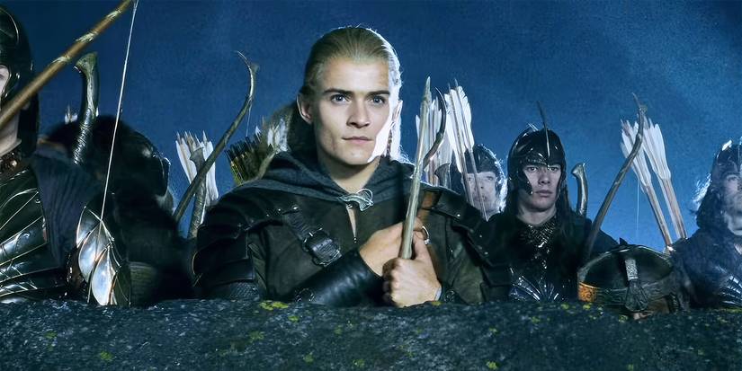 Orlando Bloom looking to the distance with soldiers behind him in The Lord of the Rings: The Two Towers