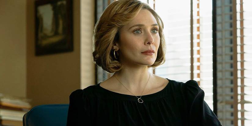 Candy sitting in a black outfit