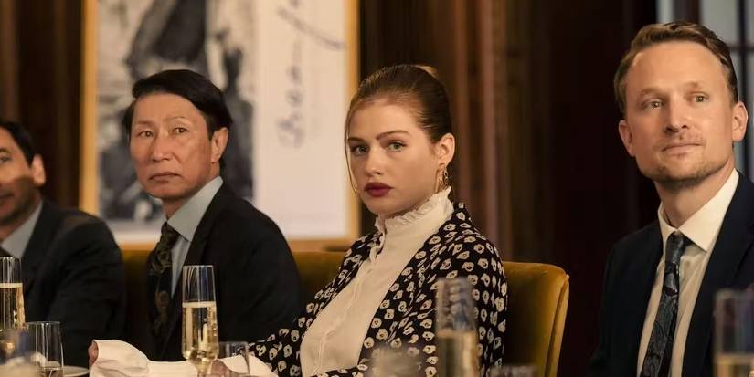 Lydia Beaufort (Sonja Weißer) sitting at a table in 'Maxton Hall'