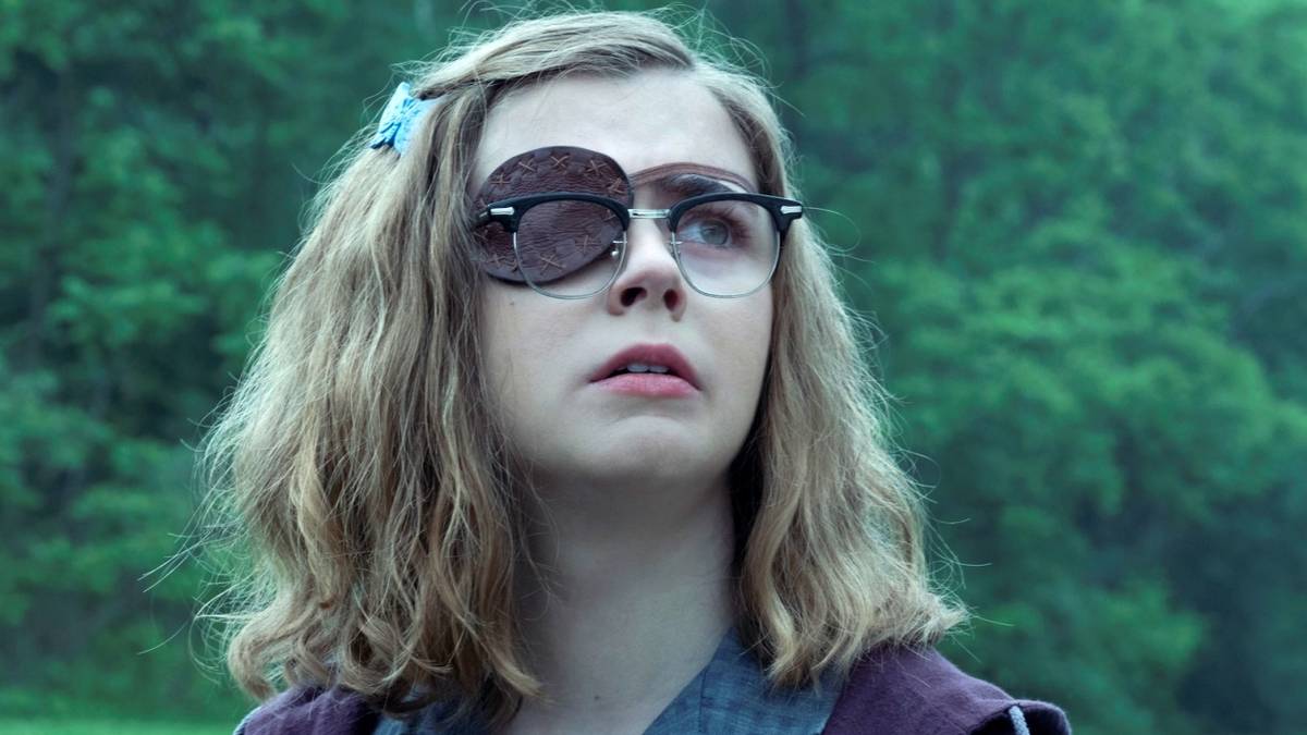 Matilda Lawler as Marge wearing an eye patch and looking scared in the finale of IT: Welcome to Derry