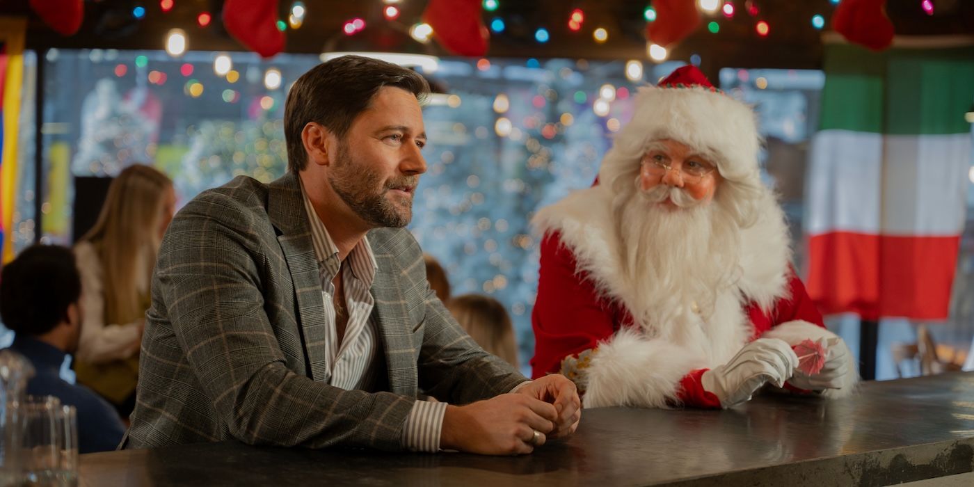 Ryan Eggold as Matthew and Alexandra Breckenridge as Santa Claus in My Secret Santa