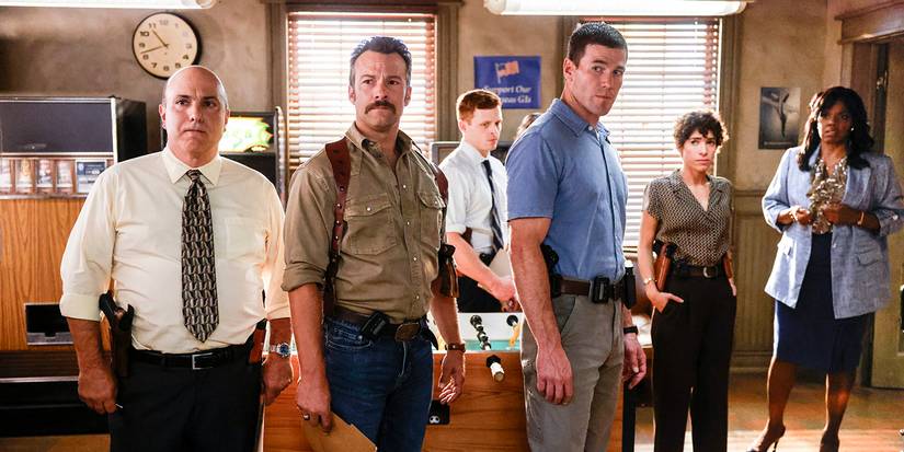 Matthew Henderson as NIS Special Agent Carl Loughlin, Kyle Schmid as Mike Franks, Caleb Foote as Bernard “Randy” Randolf, Austin Stowell as Leroy Jethro Gibbs, Diany Rodriguez as Vera Strickland, and Tyla Abercrumbie as Mary Jo Hayes in NCIS: ORIGINS Season 2 Episode 7