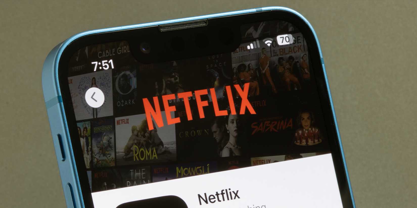 Netflix logo on a phone.