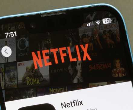 Netflix logo on a phone.
