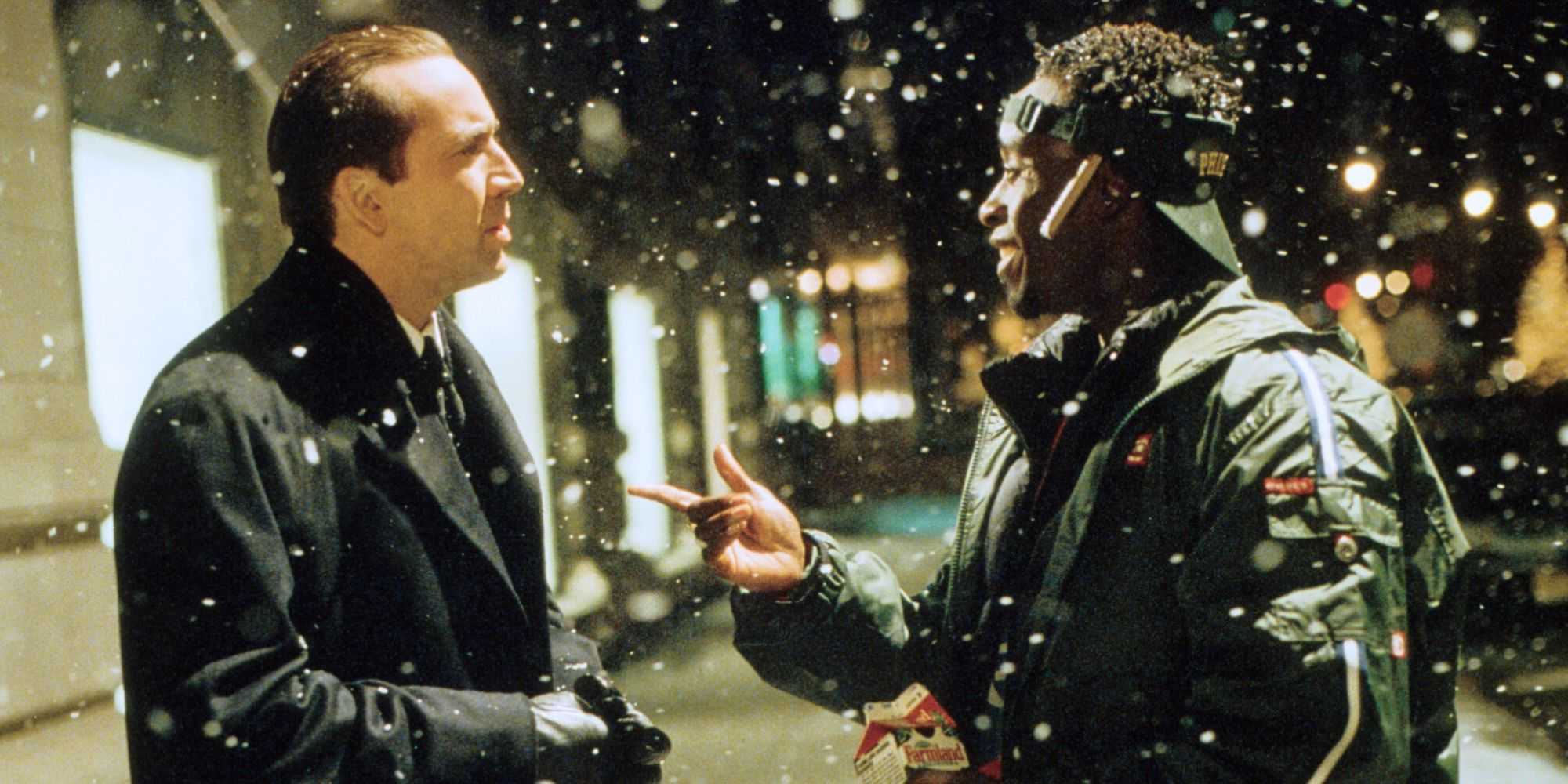 Nicolas Cage e Don Cheadle em cena do filme The Family Man (2000)
