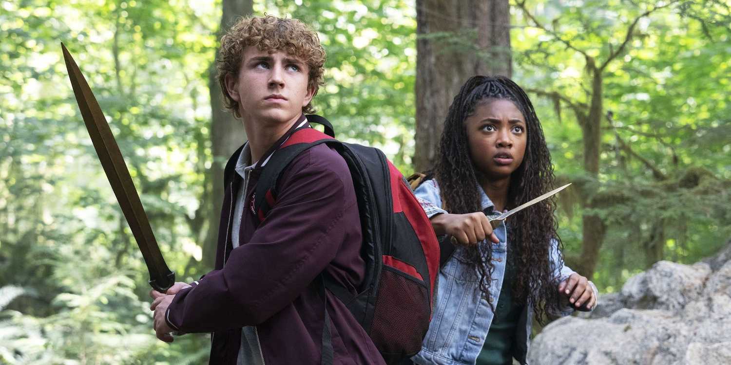 Percy and Annabeth preparing to fight with a sword and dagger in Percy Jackson & the Olympians