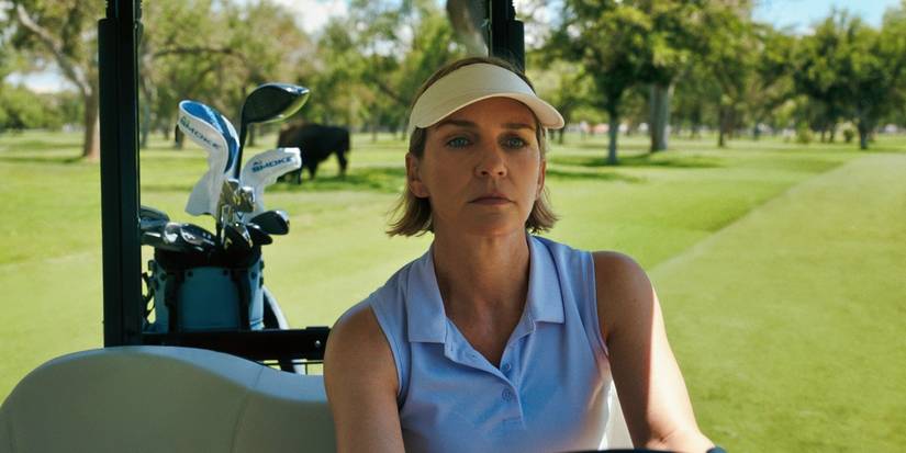 Rhea Seehorn driving a golf cart in Pluribus Episode 7