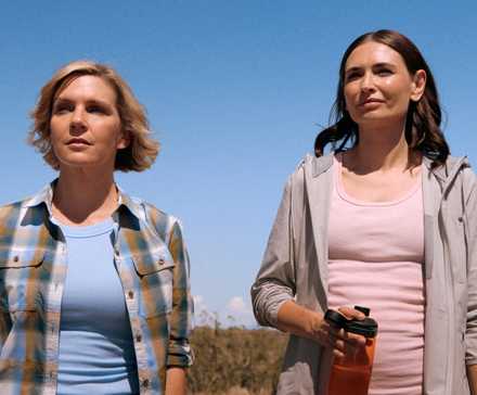 Rhea Seehorn and Karolina Wydra in Pluribus Episode 8