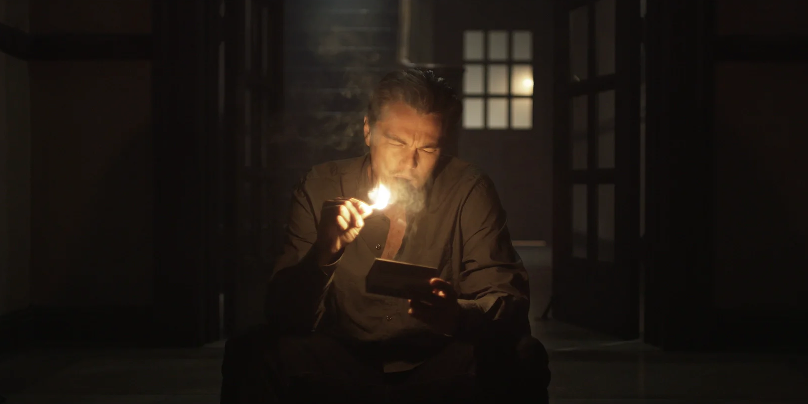 Leonardo DiCaprio holds a match in David Fincher's 'The Match' camera RED test