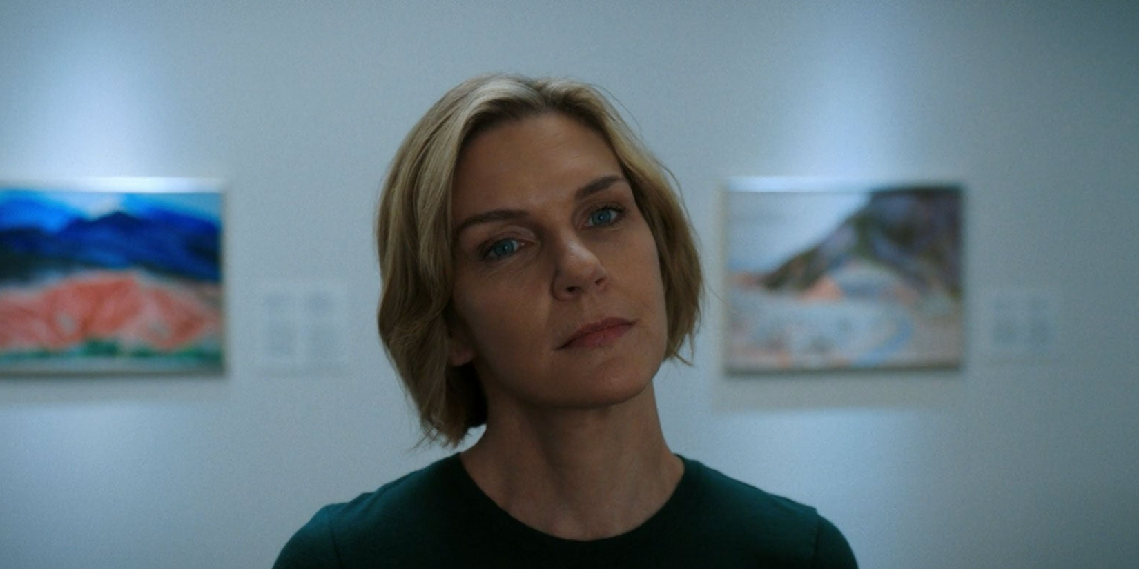 Carol (Rhea Seehorn) stands ina. museum in 'Pluribus'