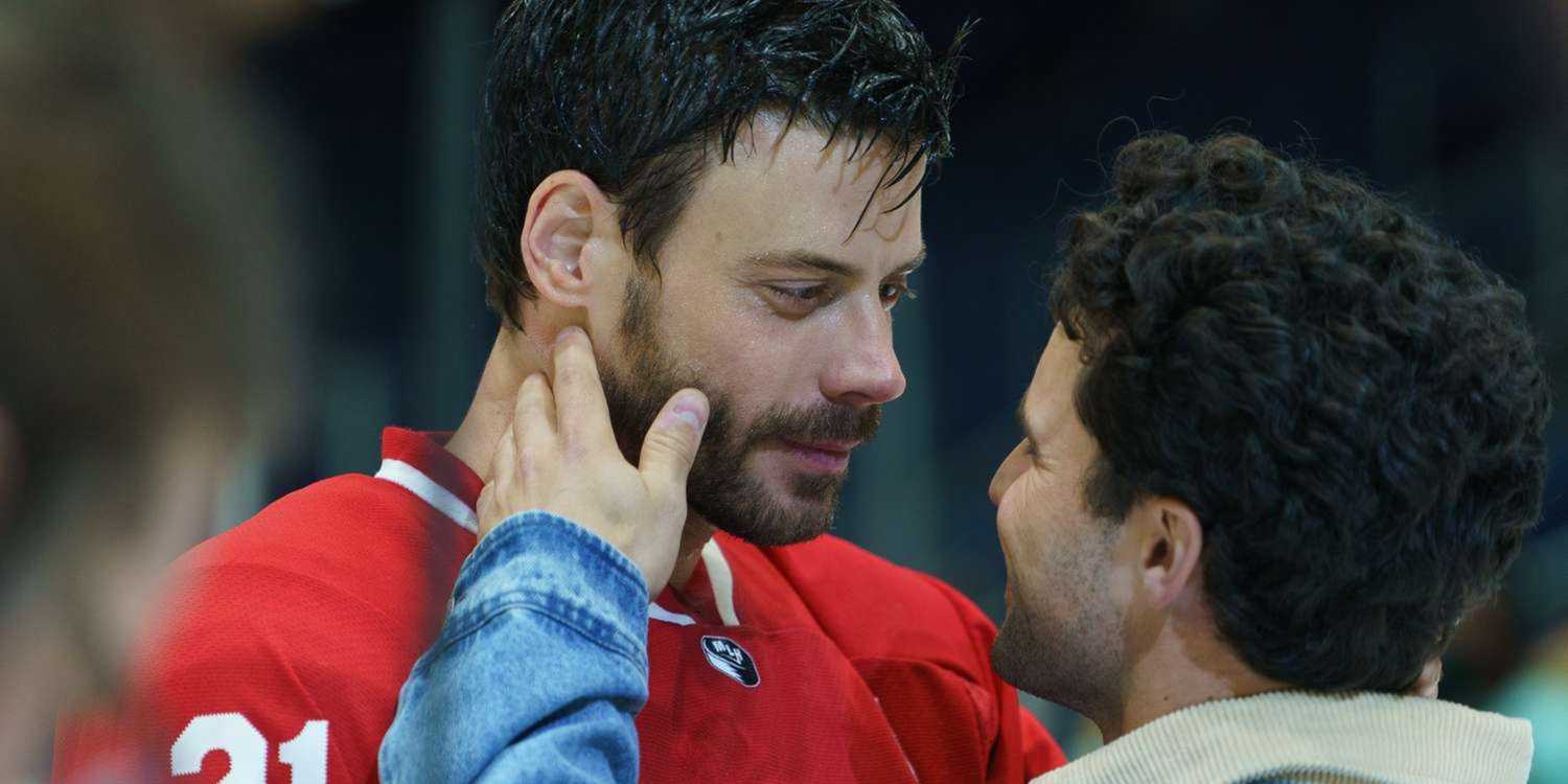 Scott Hunter and Kip Grady embracing publicly in Heated Rivalry Episode 5.