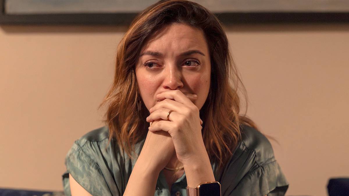 Carla Robles (Regina Blandón) crying with her hands on her mouth in Season 2 of 'The Accident'