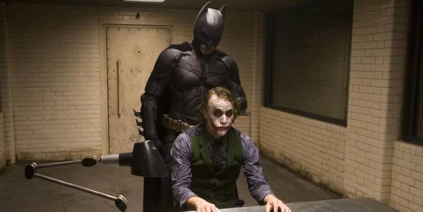 Batman (Christian Bale) looming over The Joker (Heath Ledger) in 'The Dark Knight'
