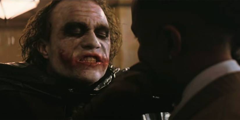 Joker (Heath Ledger) threatening Gambol (Michael Jai White) in 'The Dark Knight'