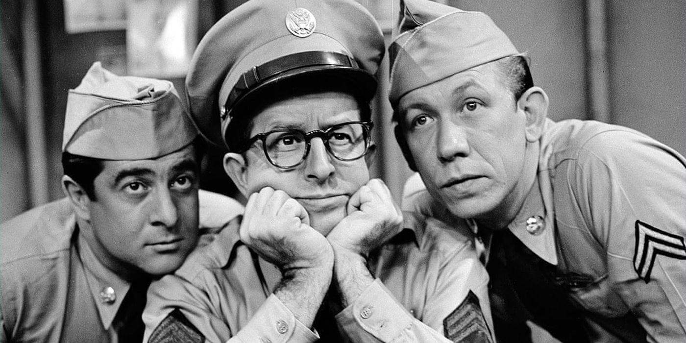 Sgt. Bilko (Phil Silvers), Cpl. Barbella (Harvey Lembeck) and Cpl. Henshaw (Allan Melvin) seen pondering in The Phil Silvers Show.