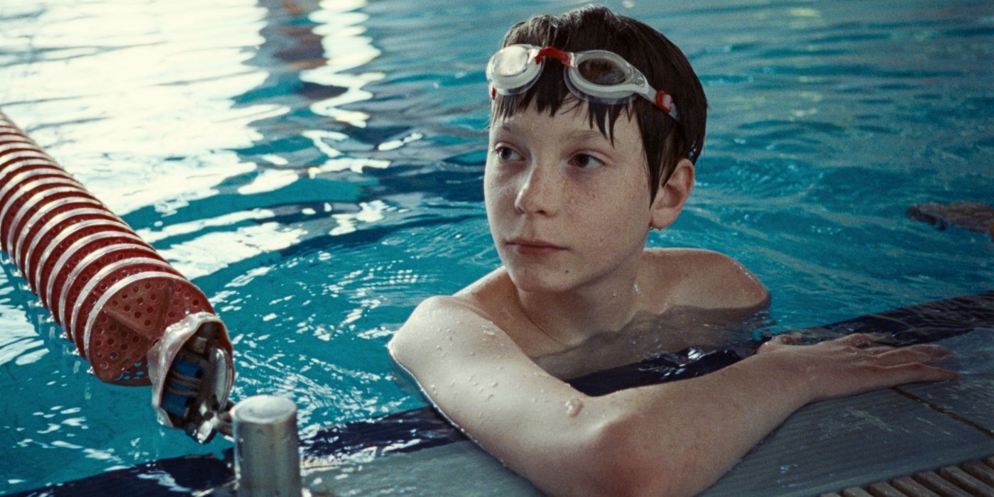 Everett Blunck as Ben at the edge of the pool in The Plague.