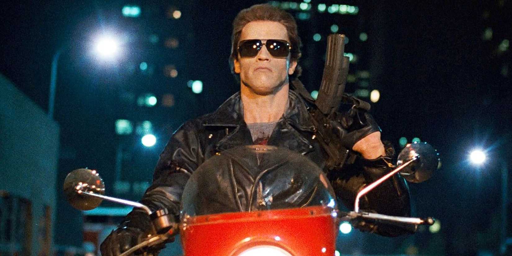 Arnold Schwarzenegger riding a motorcycle with sunglasses on through a city at night in The Terminator.