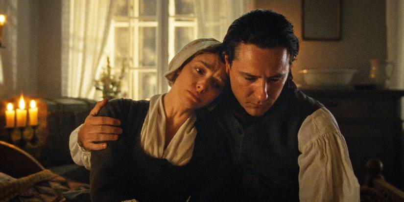 Ann Lee resting her head on William Lee's shoulder.