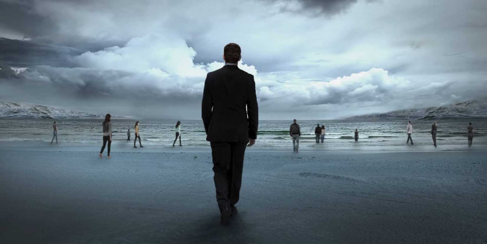 Sean Penn walks on the beach in Tree of Life