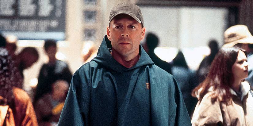 Bruce-Willis among a crowd in Unbreakable