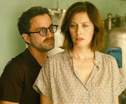 Man looking at a woman from behind