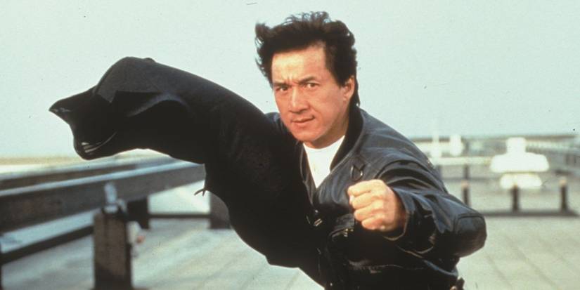 Jackie Chan posing on top of a skyscraper ready to fight in Who Am I? (1998)