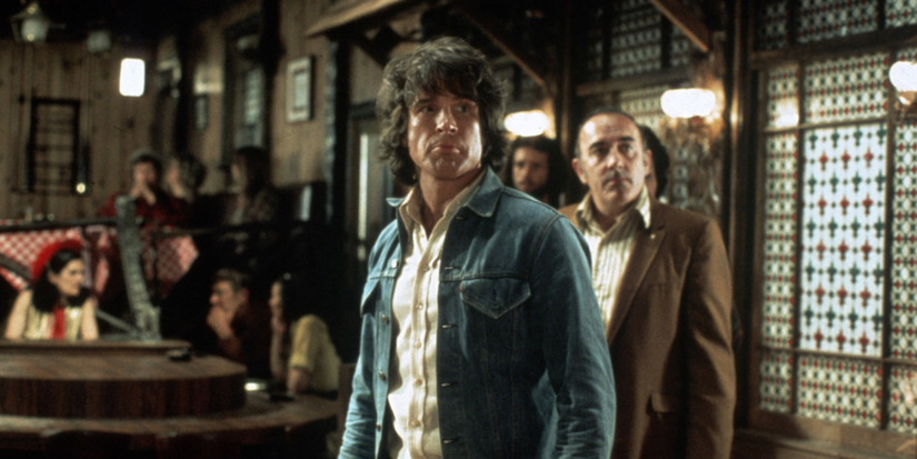 Joseph Frady looking back at a person offscreen in The Parallax View