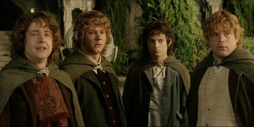 'Return of the King' - the 4 Hobbits stand together looking sad
