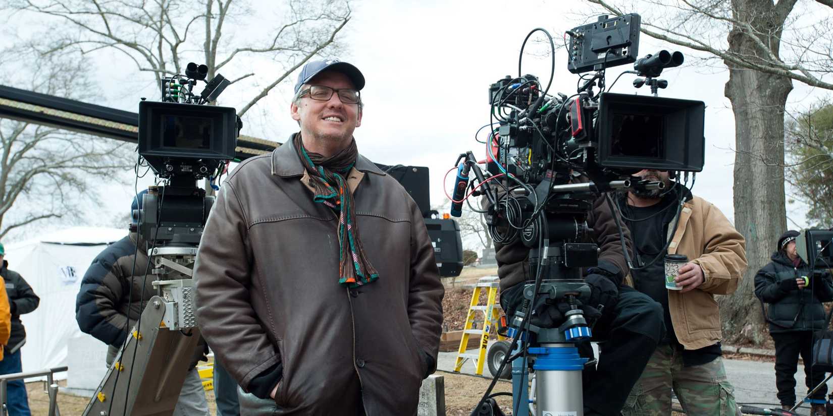 Director Adam McKay standing by cameras outdoors on the set of Anchorman 2: The Legend Continues.