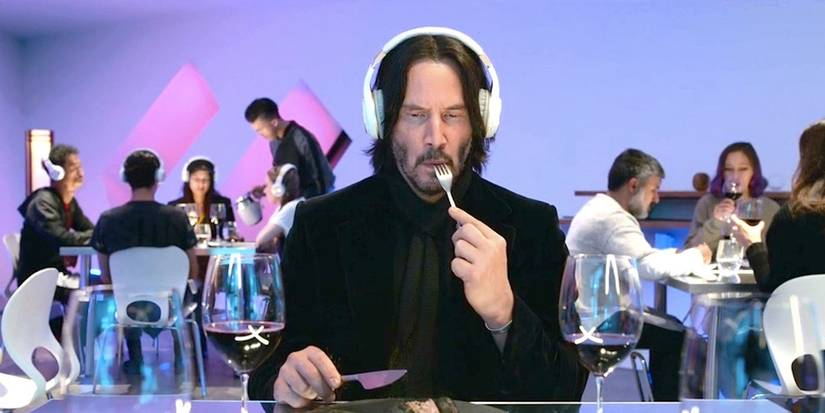 Keanu Reeves eating a meal with headphones on in 'Always Be My Maybe'