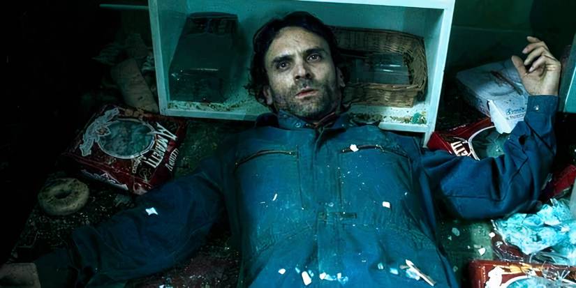 Arben Bajraktaraj as Antonin Dolohov lying in a stupor in 'Harry potter and the deathly hallows part 1'