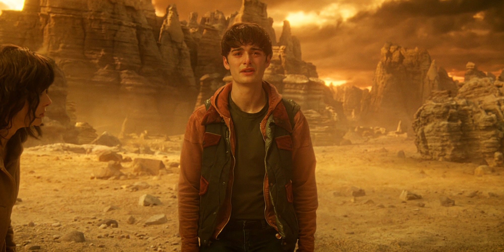 Noah Schnapp as Will Byers crying and pleading with Henry in Dimension X in the Stranger Things finale