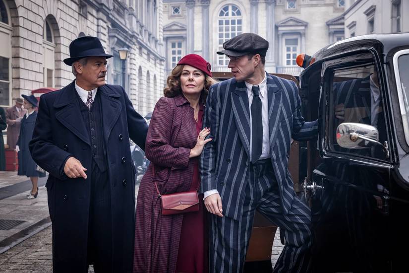 Rupert Graves encouraging a couple to get into a car in 'Bookish' Season 2