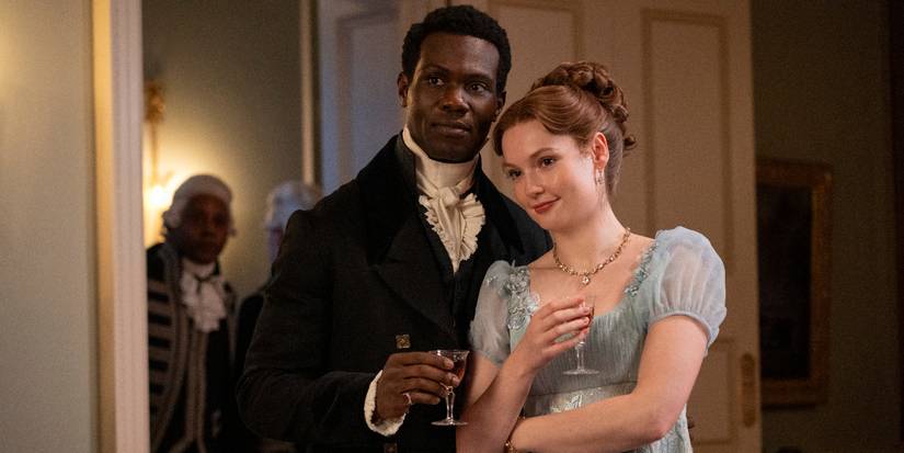 Victor Alli and Hannah Dodd standing close and looking in the same direction in Bridgerton Season 4, Episode 4.