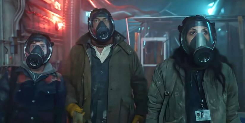 John, Allison, and Nate wearing gas masks in a bunker