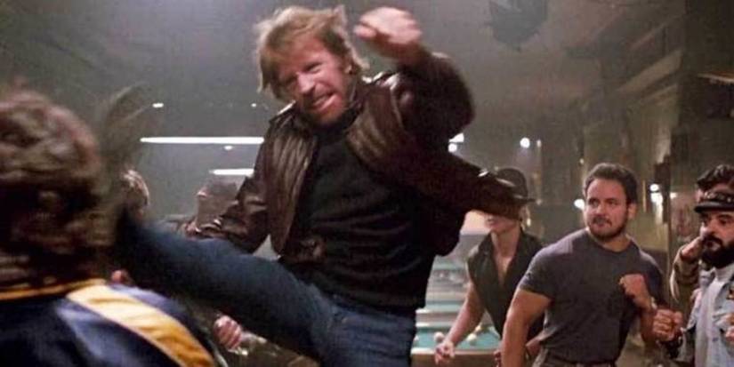 Chuck Norris kicks someone in 'Code of Silence' 