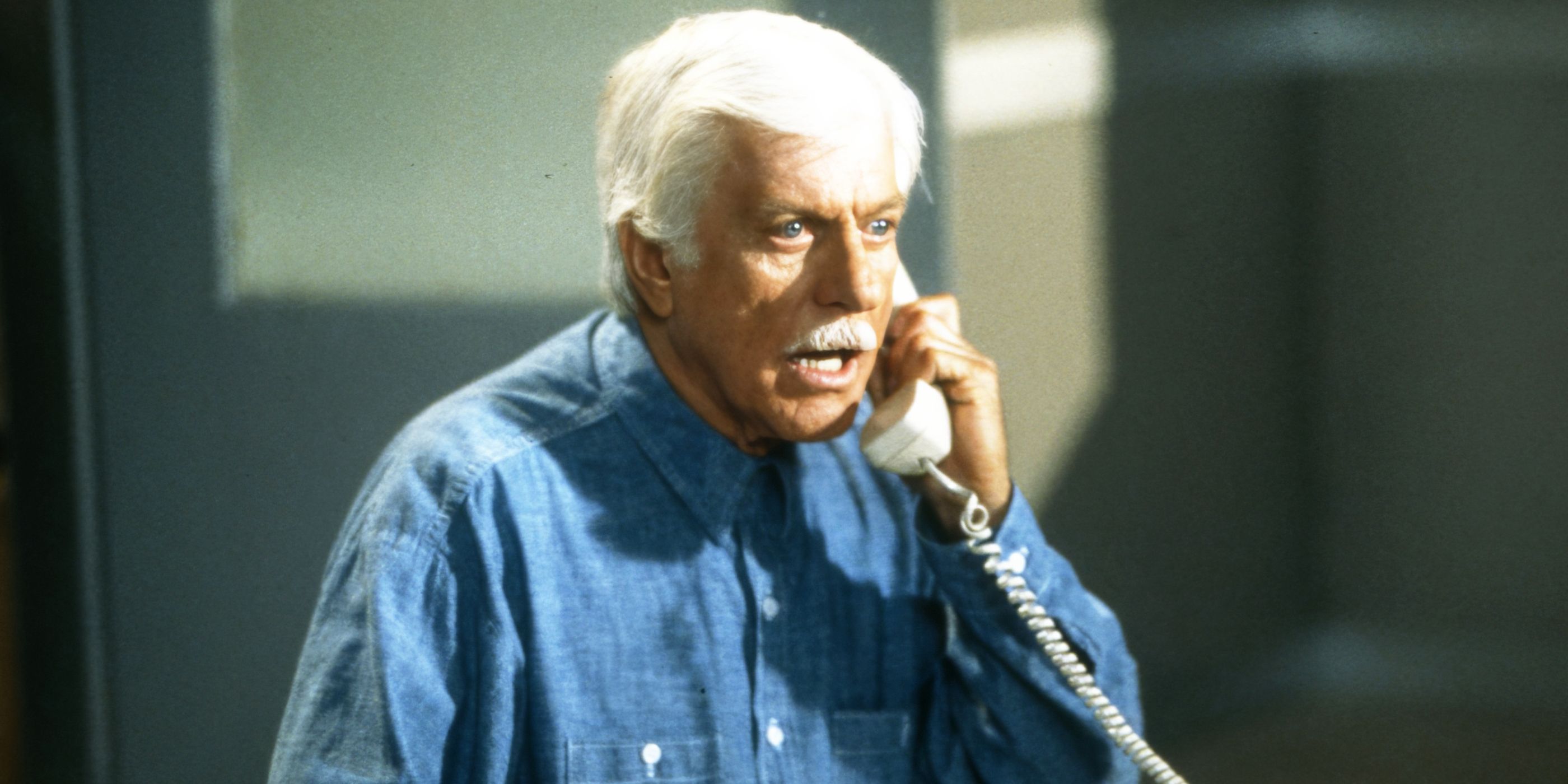 Dick Van Dyke looking shocked on the phone in Diagnosis Murder