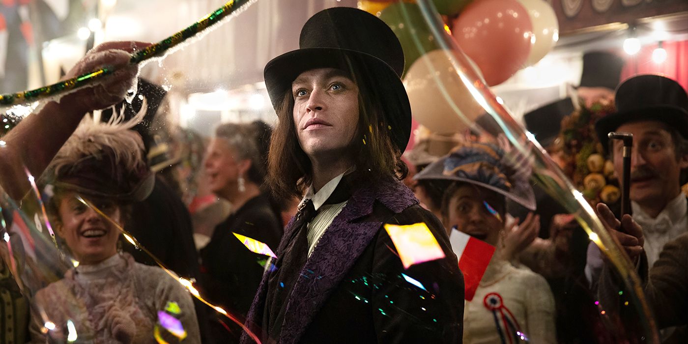 Dracula walks through a crowd of people at a party.