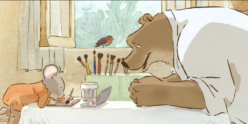 Ernest the bear watching the little mouse Celestine painting in 'Ernest & Celestine'